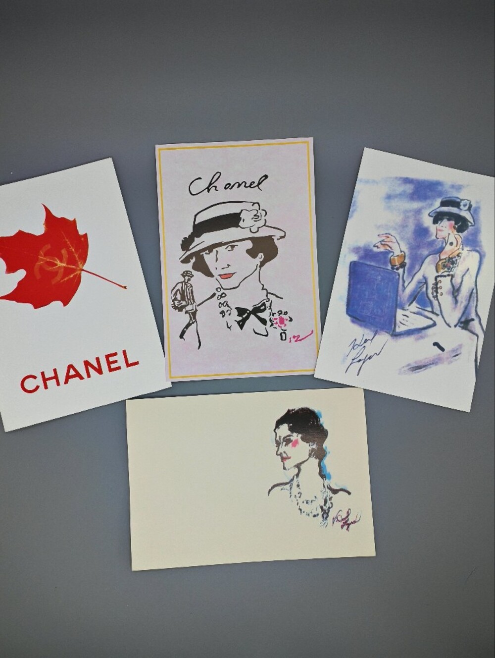 Illustrated postcard featuring a sketch of Coco Chanel by Karl Lagerfeld